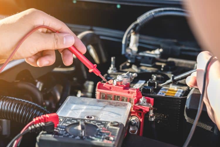 Can a weak battery cause transmission problems
